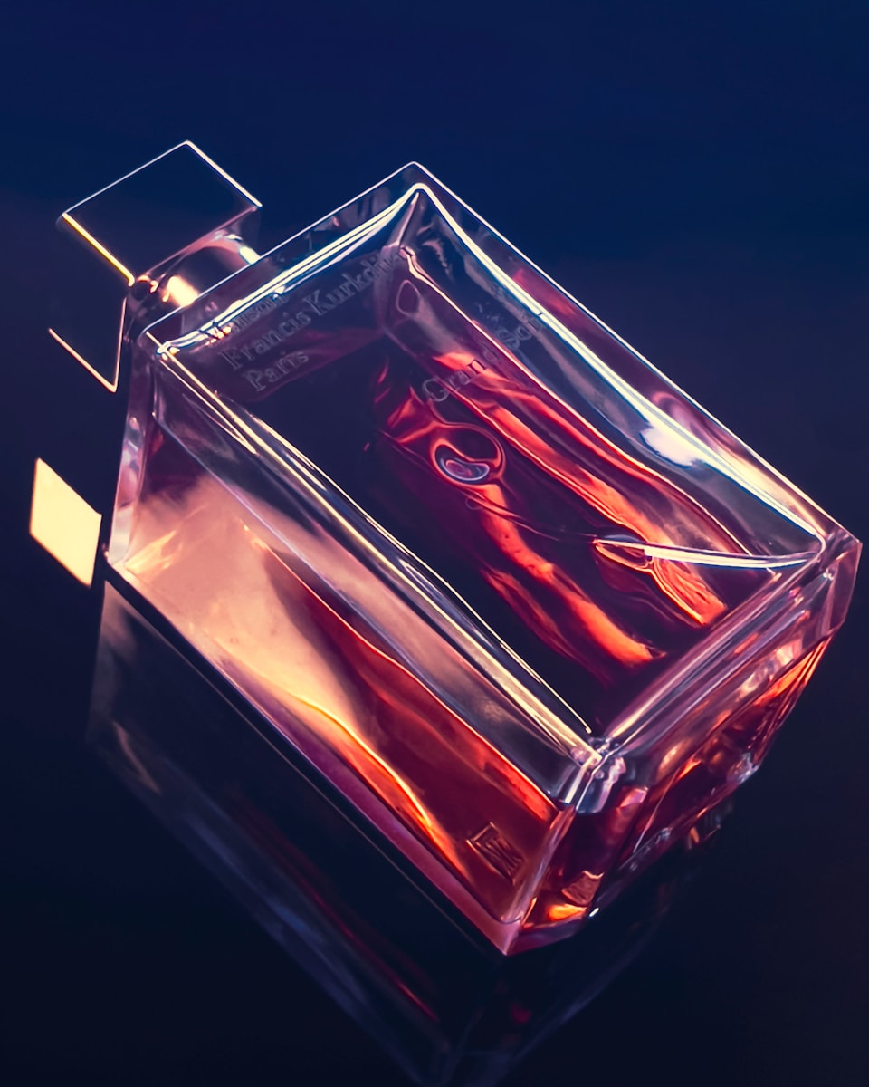 red and gold perfume bottle